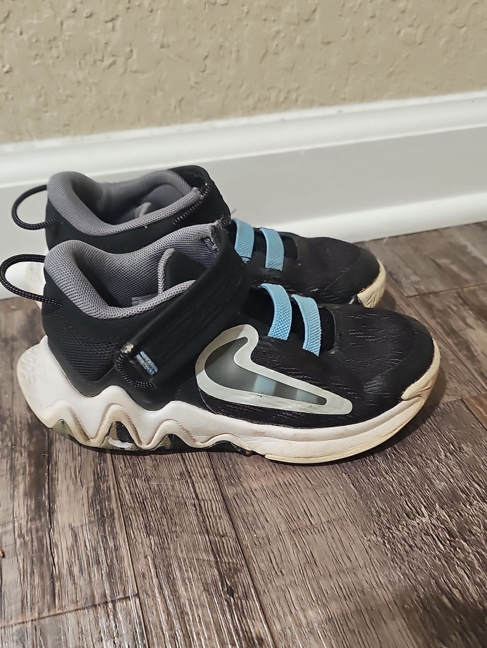 Kids Black and Light Blue Nike Athletic Sneakers - Lightweight Comfort
